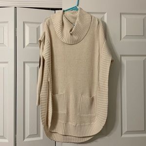 cream colored poncho style sweater